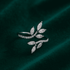 Planet Genesis - Diamond Vinea Arc Ring with marquise-cut diamonds in a leaf motif and pavé band, shown on dark green velvet. Premium fine jewelry. - IGI-Certified Lab-Grown Diamonds