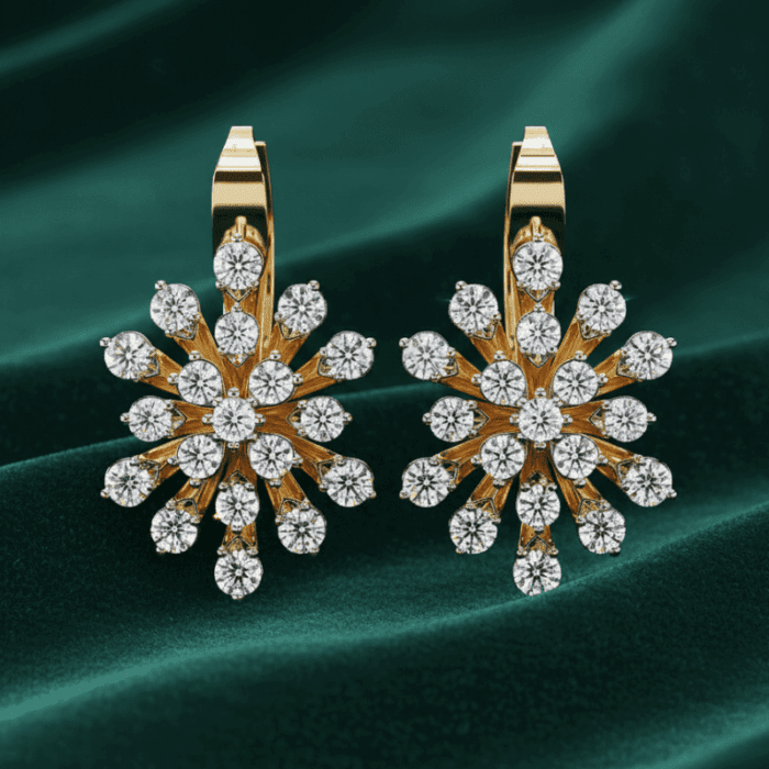 Planet Genesis - Gold snowflake earrings with multiple white diamonds, premium design, displayed on dark green velvet background. - IGI-Certified Lab-Grown Diamonds