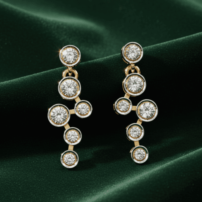 Planet Genesis - Moonlit Cascade Diamond Drop earrings in gold, featuring clustered round diamonds in a vertical design on dark green velvet fabric. - IGI-Certified Lab-Grown Diamonds