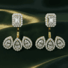 Planet Genesis - Aurora Halo Diamond Drop Earrings with rectangular diamond studs and three teardrop diamond dangles, each haloed by pavé diamonds, on green satin. - IGI-Certified Lab-Grown Diamonds