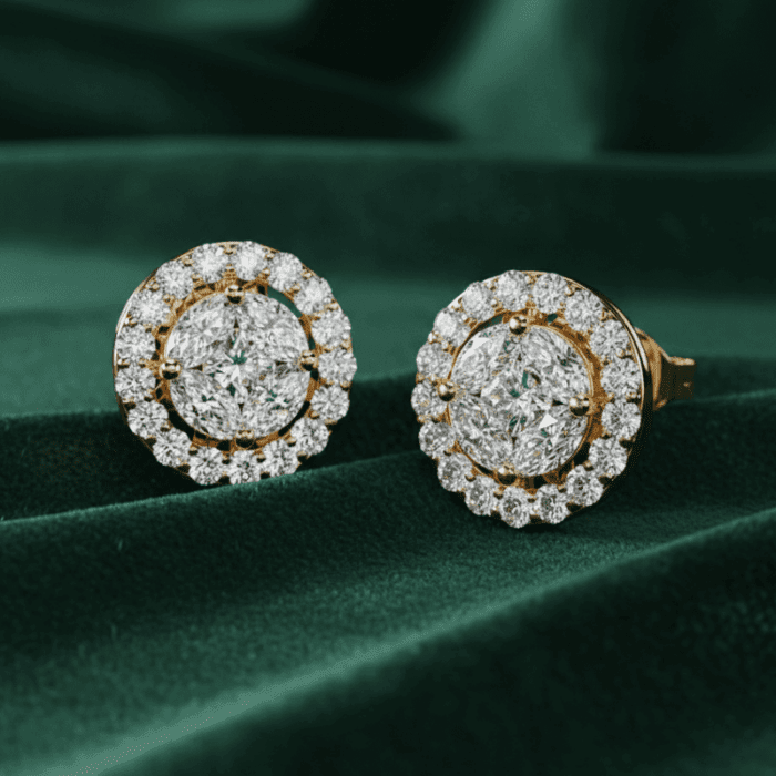 Planet Genesis - Diamond stud earrings with a large central round diamond, double halo of smaller diamonds, set in white metal on green velvet. - IGI-Certified Lab-Grown Diamonds Planet Genesis - Diamond stud earrings with a large central round diamond, double halo of smaller diamonds, set in white metal on green velvet. - IGI-Certified Lab-Grown Diamonds