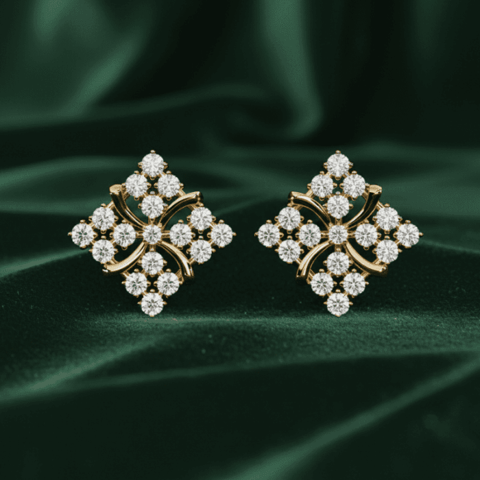 Planet Genesis - Diamond Clover Halo Earrings with a symmetrical floral motif and pavé diamonds displayed on rich dark green velvet fabric. - IGI-Certified Lab-Grown Diamonds