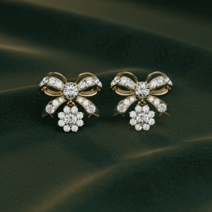 Planet Genesis - Gold bow-shaped earrings with white diamonds and diamond clusters, filigree design, displayed on dark green velvet. - IGI-Certified Lab-Grown Diamonds Planet Genesis - Gold bow-shaped earrings with white diamonds and diamond clusters, filigree design, displayed on dark green velvet. - IGI-Certified Lab-Grown Diamonds